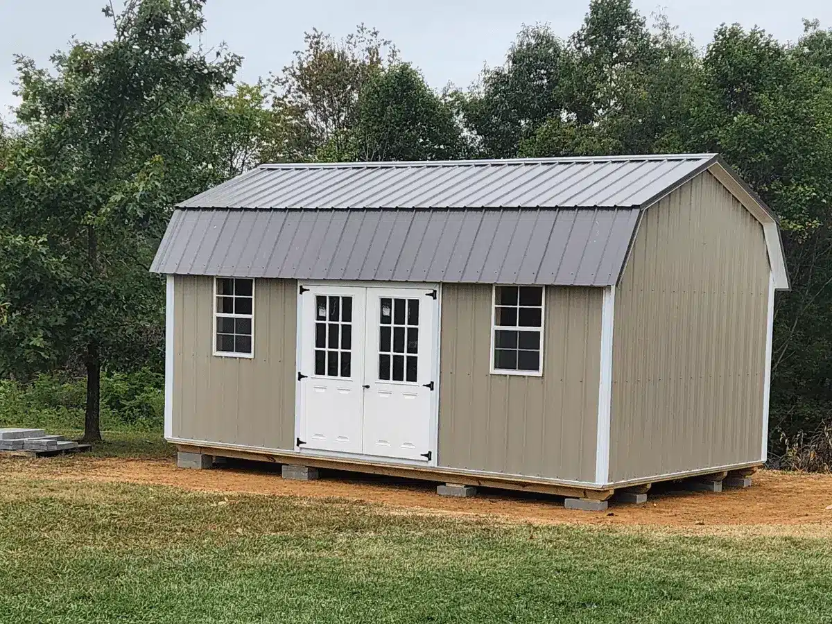 14x32 brown parn shed whith white doors.png