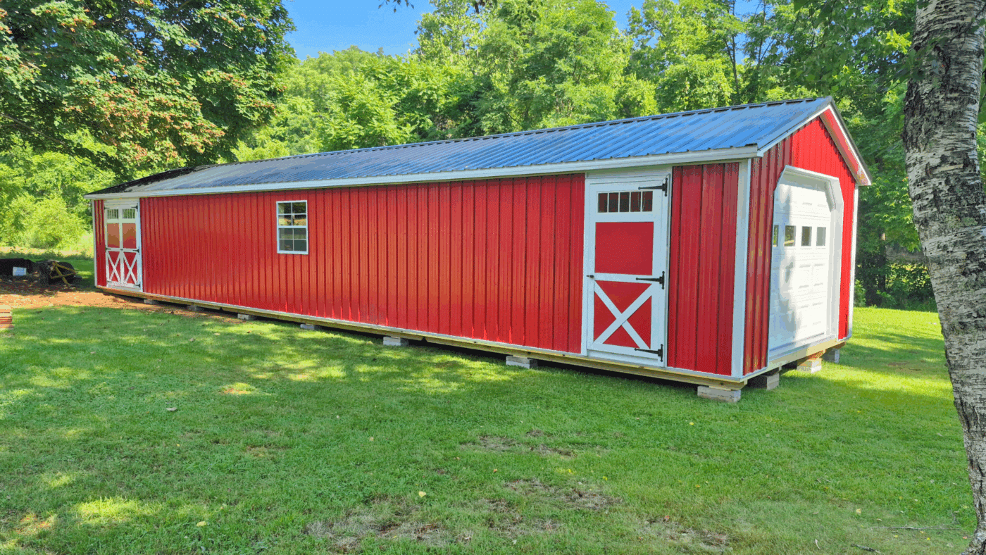 14x56 metal shed sitting in a yard in ivanhoe va from premier building solutions