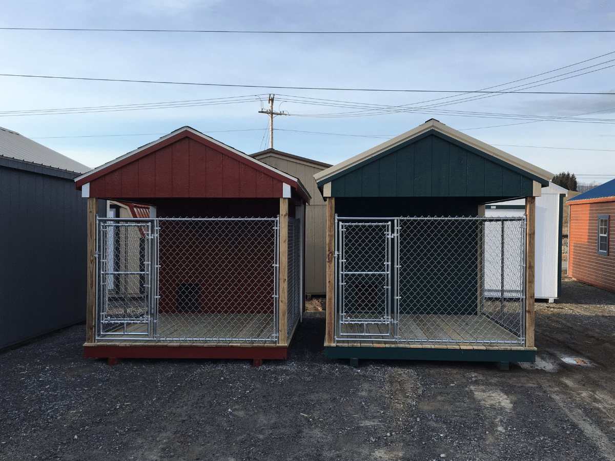two dog kennels on a sales lot in western virginia