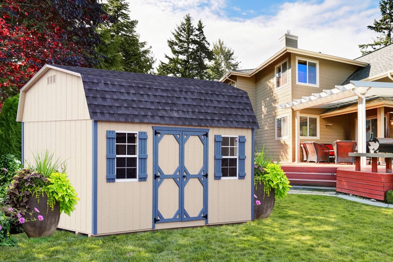 luxury waterfront house exterior with well kept lawn