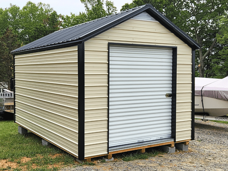 Tan enclosed metal prefab garage with a roll down door