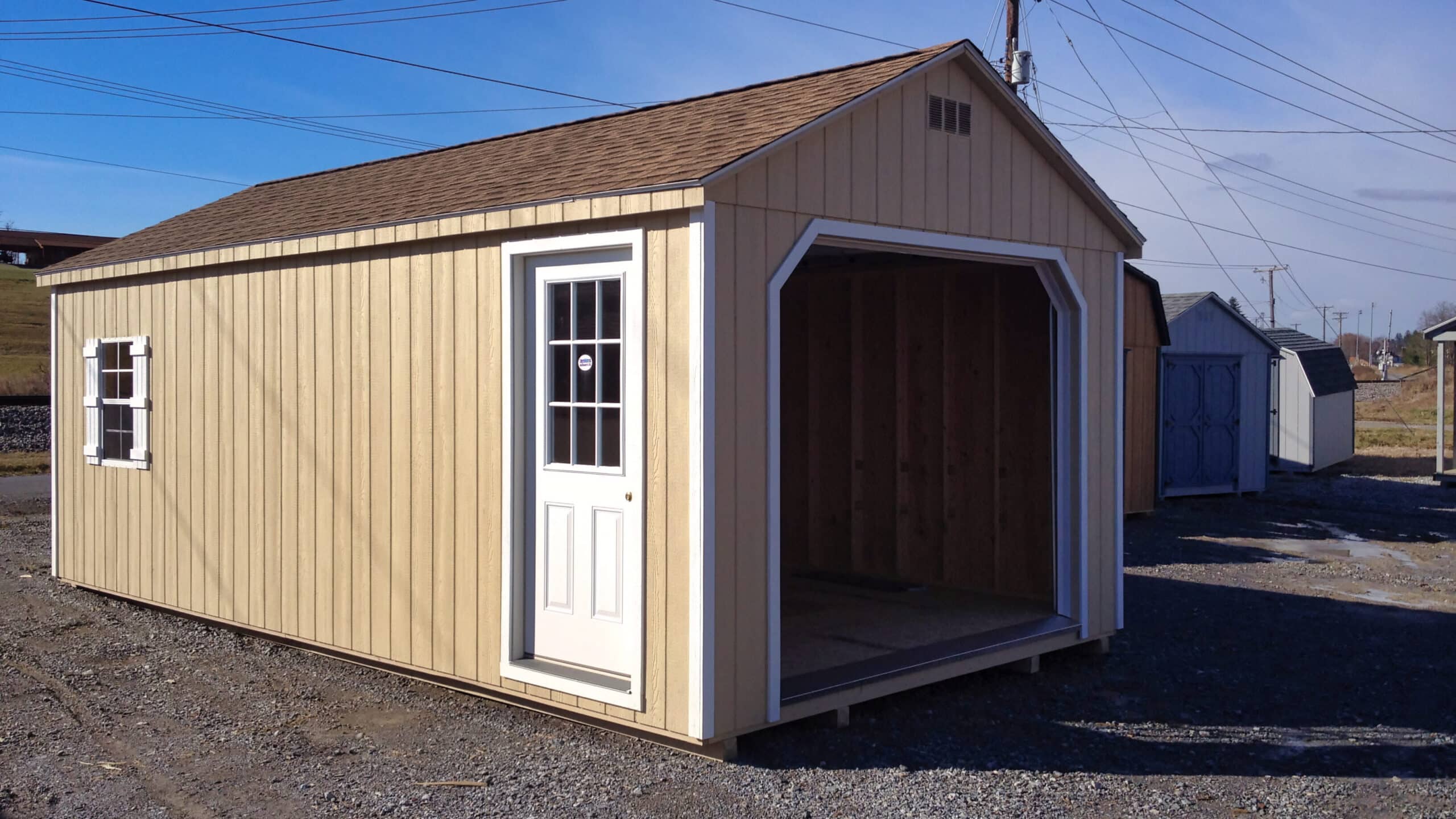 brown wooden garage from premier building solutions