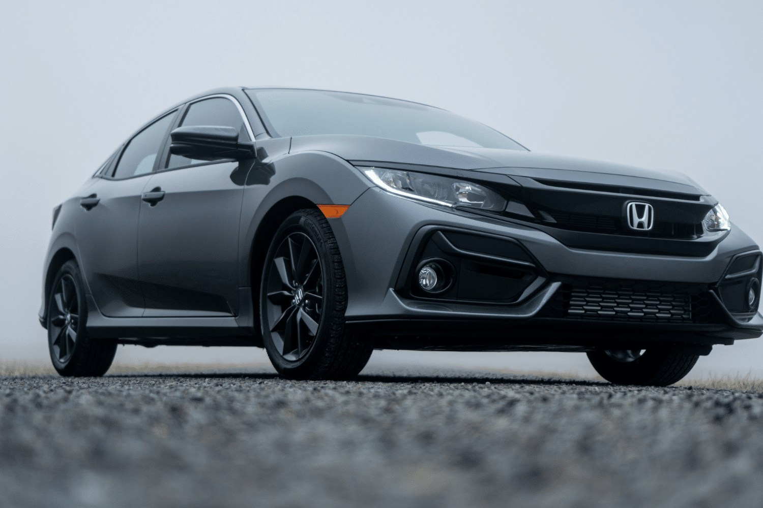grey Honda civic can easily fit in a 20x20 garage